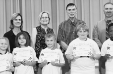 CALVIN Left to right: Bella Perot, Blair Babers, Knox Reed, Carter Holmes, Kayden Mattox. Teacher Kim Dupree, Kiwanians Mary Lou Blackley and Troy Rogers, Principal Justin Tinsley.