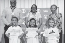 WINNFIELD PRIMARY SCHOOLKindergarten Left to right: Taylor Reppond, Jade Ramirez, Violet Sepulvado. Principal Byron King, Assistant Principal Resa Johnson, Kiwanian Ethel Howell