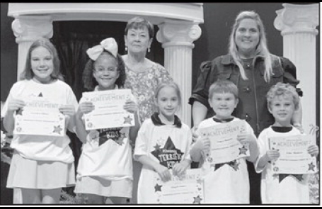 Dodson From left: Creedyn Elliott, Journi Carpenter, Abigail James, Taigen Hanson and Luke Mathews. Kiwanian Margaret Coon and Principal Wendy Miller.