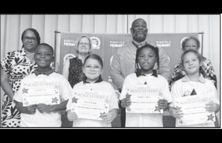 Winnfield Primary School – Third Grade From left: Terrell Jules, Kinlee Higgs, Hayden Jones and Cadence Barthelemy. Assistant Principal Resa Johnson, Kiwanian Mary Lou Blackley, Principal Byron King and Kiwanian Ethel Howell.