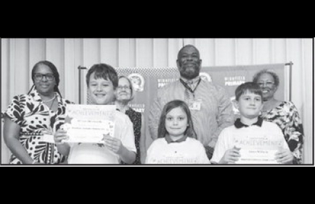 Winnfield Primary School – Fourth Grade From left: William DiBenedetto, Elayna Francis and Owen Williams. Assistant Principal Resa Johnson, Kiwanian Mary Lou Blackley, Principal Byron King and Kiwanian Ethel Howell.