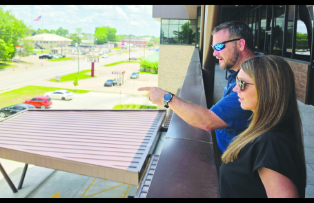 Chet and Miranda Atkins enjoy the view from the balcony