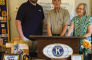 Left to right: Guest Jeremy Brister, Troy Rogers, President of Winn Genealogical and Historical Association, Kiwanis President Mary Lou Blackley.