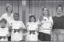 Calvin From left: Cooper Thomas, Marshall Ray, Karlee Knowles, Ava Meadows and Kenna Bonnette. Teacher Kim Dupree, Kiwanian Miranda Atkins and Principal Justin Tinsley.