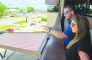 Chet and Miranda Atkins enjoy the view from the balcony