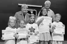 DODSON Left to right: Katherine Gates, Abigail James, Hadley James, Ivy Sonnier, Charleigh Kait Boyett, Assistant Principal Mrs. Dawkins, Kiwanian Lamar Tarver