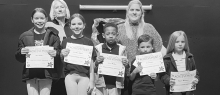 DODSON Left to right: Maci McGee, Creedyn Elliott, Cree Walker, Levi Caskey, Klaire Hattaway. Kiwanian Rita James and Principal Wendy Miller.