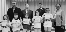 Calvin Left to right: Emmy Maricelli, Mason Jacobs, Zoey Hanson, Ashton Bates, Marlee Bates., Principal Justin Tinsley, Kiwanians Bryan Price, Troy Rogers, Ethel Howell.