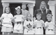 Dodson From left: Creedyn Elliott, Journi Carpenter, Abigail James, Taigen Hanson and Luke Mathews. Kiwanian Margaret Coon and Principal Wendy Miller.