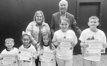 Dodson High School (L-R): Taigen Hanson, Avery Moras, Cheyenne Broomfield, Vivian Costanza, Brantley Tucker, Principal Wendy Miller and Kiwanian Lamar Tarver
