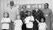 WPS - Kindergarten Left to right: Alayshia Brown, Ellie Stroud, Kenya Ball, Gabrielle Breaux. Principal Byron King, Kiwanians Ethel Howell and Mary Lou Blackley, Assistant Principal Resa Johnson.