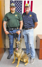 Deputy Joey Carrithers, Deputy Ruby Gene, and Sheriff Josh McAllister.