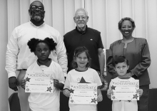 WPS Kindergarten Left to right: Ta’Niya Taylor, Amelia Olmos, Cannon Gaines, Principal Byron King, Kiwanians Dr. Jerry Pipes and Ethel Howell.
