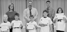Calvin Left to right: Samuel Wise, Ryder Braswell, Lucas Knotts, Jake Garrett, Charlotte Cummings. Teacher Kim Dupree, Principal Justin Tinsley, Kiwanian Troy Rogers.