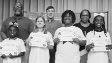 WINNFIELD PRIMARY SCHOOL Grade 4 Left to right: China Allen, Lena Jones, Isaac Gauthier, Justice Stringer. Principal Bryon King, Kiwanian Troy Rogers, Assistant Principal Resa Johnson.