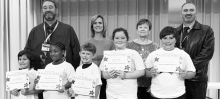 CALVIN Left to right: Charlie Villafranco, Karlee Knowles, Eli Carson, Hayden Allen, Grayson Edwards. Assistant Principal Scott DuBois, Teacher Kim Dupree, Kiwanian Margaret Coon, Principal Justin Tinsley.