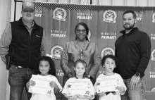 WPS K Left to right: Alayna Jones, Emory St Andrie, Kingston Blunt. Kiwanian Sheriff Josh McAllister, Assistant Principal Resa Johnson, Kiwanian Chet Atkins.