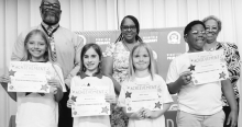 WINNFIELD PRIMARY SCHOOL-Grade 3 Left to right: Passion Burch, Olivia Griffin, Carrie Johnson. Principal Byron King, Assistant Principal Resa Johnson, Kiwanian Ethel Howel