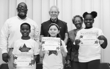 WPS Grade 4 Left to right: DeSean Turner, Winnie Parrack, Kendrieka Davis, Principal Byron King, Kiwanians Dr. Jerry Pipes and Ethel Howell.