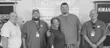Pictured (L to R): Winnfield Middle School Principal Brent Carpenter; WMS Head Football Coach and 8th Grade Math Teacher Chance Williams; Winnfield Kiwanian and retired WMS educator Ethel Howell; WMS Offensive Line and PE Coach Justin Durbin; and WMS Defe