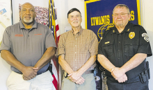 Left to right: Jesse Phillips, Troy Rogers, and Chuck Curry, Assistant Chief of Police.