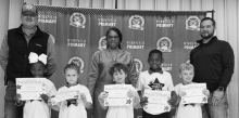 WPS 1st Grade Left to right: Blessen Fontenot, Charlie Williams, Stetson Clark, Jay’Ceion Durham, Liam Martin. Kiwanian Sheriff Josh McAllister, Assistant Principal Resa Johnson, Kiwanian Chet Atkins.