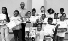 Pictured Mayor Hamms, Madison Foster, Parent Volunteer Whitney Banks and School Board member Michelle Carpenter- Johnson with the science kids