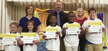 Calvin Left to right: Mila Webb, Ariella Stone, Kam Mattox, Riley Robinson, Stetson Yruegas. Teacher Kim Dupree, Principal Justin Tinsley, Kiwanian Mary Lou Blackley.