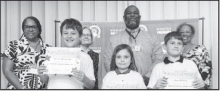 Winnfield Primary School – Fourth Grade From left: William DiBenedetto, Elayna Francis and Owen Williams. Assistant Principal Resa Johnson, Kiwanian Mary Lou Blackley, Principal Byron King and Kiwanian Ethel Howell.