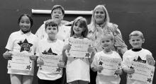 Dodson Left to right: Genesis Walker, Grayson Thomas, Bryleigh Hayes, Kayden Doughty, Koda Broomfield. Kiwanian Margaret Coon and Principal Wendy Miller.