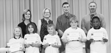 CALVIN Left to right: Bella Perot, Blair Babers, Knox Reed, Carter Holmes, Kayden Mattox. Teacher Kim Dupree, Kiwanians Mary Lou Blackley and Troy Rogers, Principal Justin Tinsley.