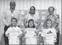 WINNFIELD PRIMARY SCHOOLKindergarten Left to right: Taylor Reppond, Jade Ramirez, Violet Sepulvado. Principal Byron King, Assistant Principal Resa Johnson, Kiwanian Ethel Howell