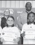 Winnfield Primary School – Third Grade From left: Terrell Jules, Kinlee Higgs, Hayden Jones and Cadence Barthelemy. Assistant Principal Resa Johnson, Kiwanian Mary Lou Blackley, Principal Byron King and Kiwanian Ethel Howell.
