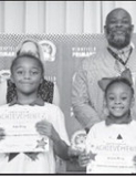 Winnfield Primary School – Second Grade From left: Kaliyah Starks, Noe King, Ariyan King and Andrew Lacour. Assistant Principal Resa Johnson, Kiwanian Mary Lou Blackley, Principal Byron King and Kiwanian Ethel Howell.