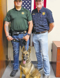 Deputy Joey Carrithers, Deputy Ruby Gene, and Sheriff Josh McAllister.