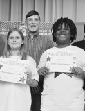 WINNFIELD PRIMARY SCHOOL Grade 4 Left to right: China Allen, Lena Jones, Isaac Gauthier, Justice Stringer. Principal Bryon King, Kiwanian Troy Rogers, Assistant Principal Resa Johnson.