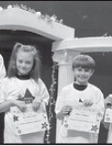 DODSON Left to right: Zoe Muse, Josie Broomfield, Nathan Roppolo, Noah Treadway, Kaylee Blackstock. Principal Wendy Miller, Kiwanian Rita James